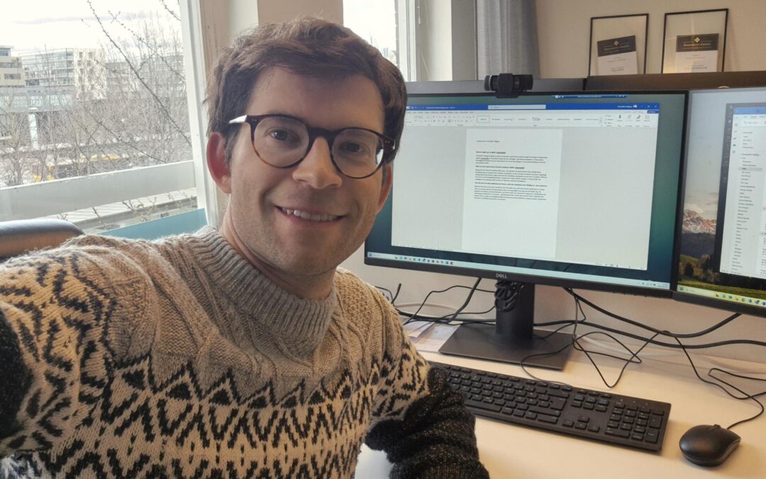 Christoffer at his office desk.